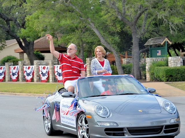 Riding in Car as Grand Marshals