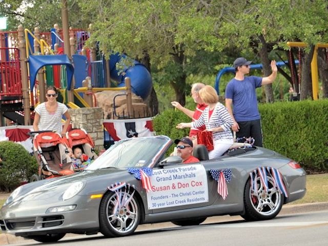 Riding in Car as Grand Marshals